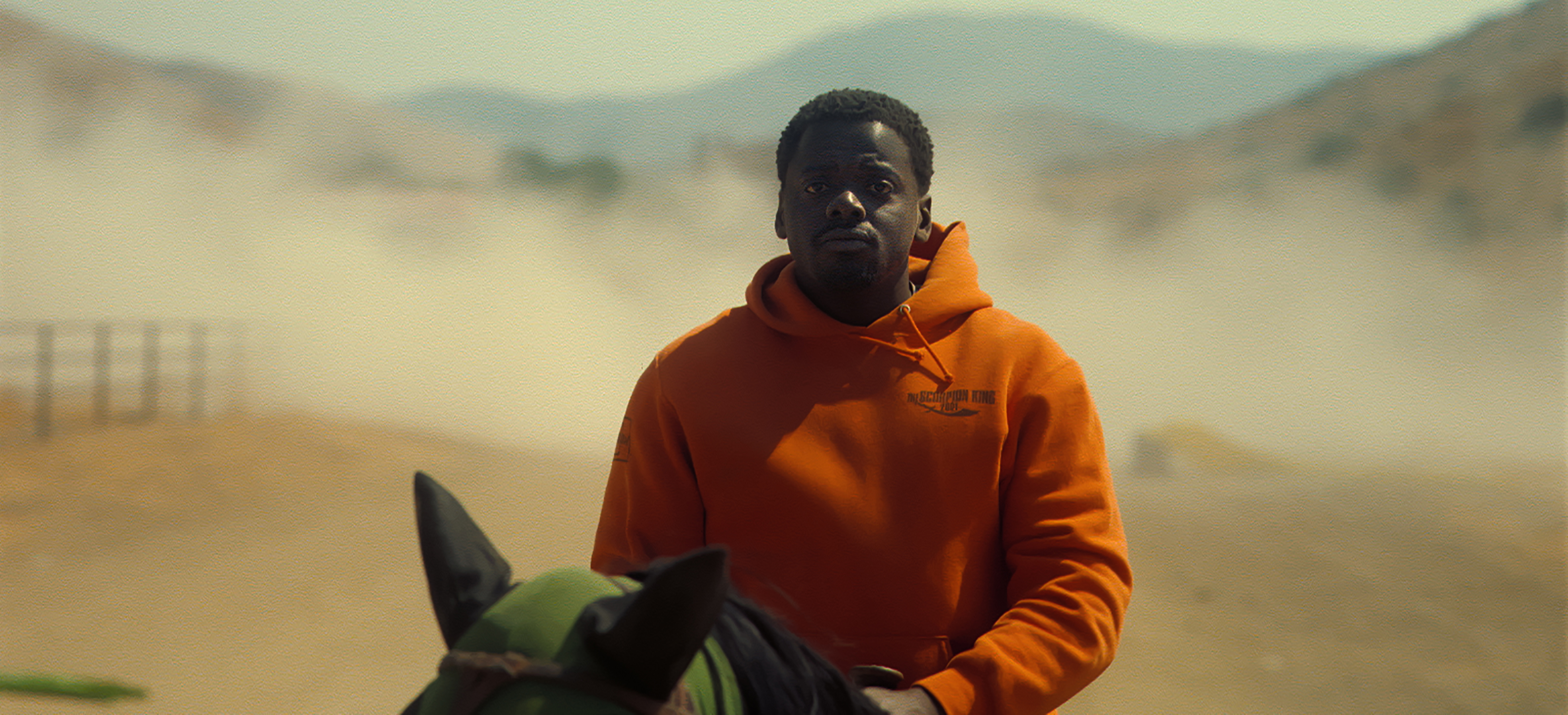 Character OJ on horse Lucky preparing to take on Jean Jacket