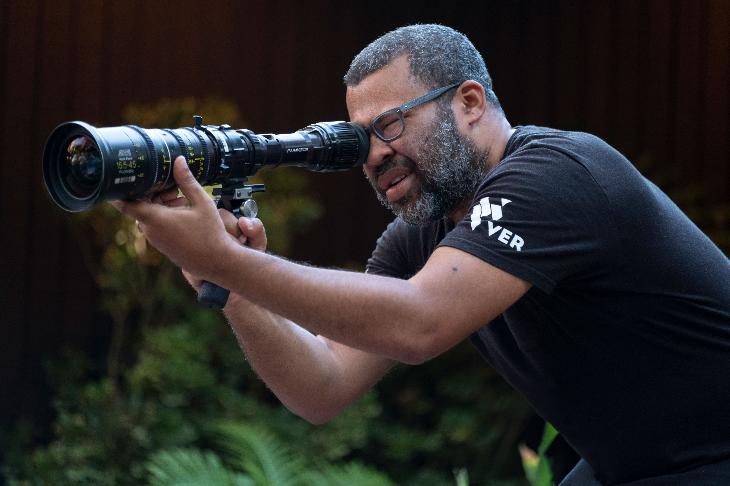 Jordan Peele on the set of the 2019 film US looking through viewfinder.