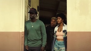 Scene from Nope: Daniel Kaluuya, Brandon Perea, and Keke Palmer standing in a doorway