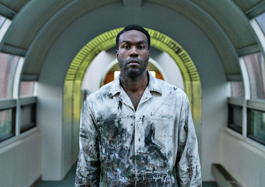 Yahya Abdul-Mateen II stars as haunted painter Anthony McCoy in Nia DaCosta's "Candyman."